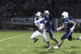Jack Foote scored the Tigers' second touchdown Friday night in Paso Robles. He's shown here in a game from last year.